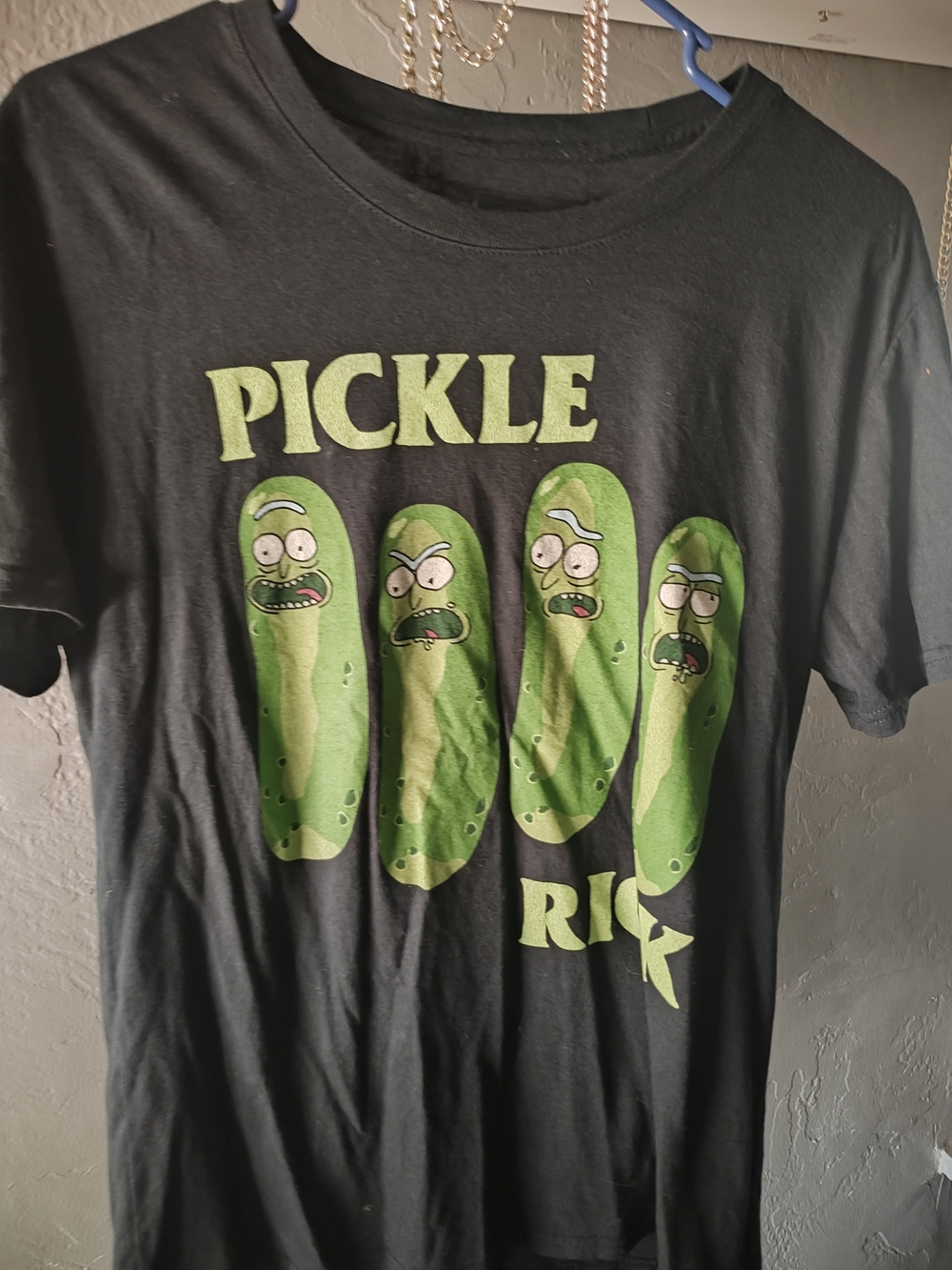 Rick and Morty-Ripple Junction Black T‑Shirt with Green Pickle Graphic